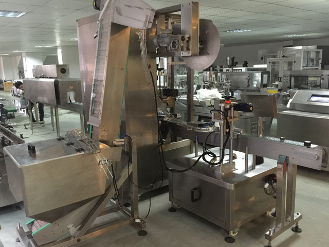 தொப்பிகள் தூக்கும் அமைப்பு.jpg