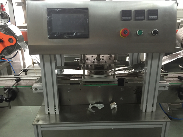 ஜாடிகளை சீல் செய்யும் இயந்திரம்.jpg