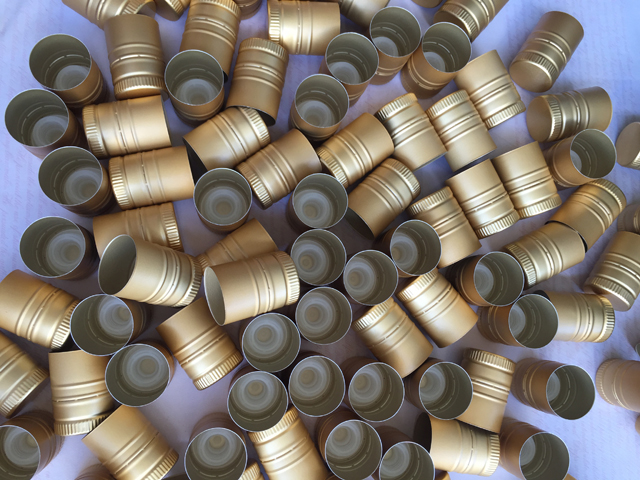 caps samples sent from usa customer for capping machine அலுமினியம் தொப்பிகள்.jpg