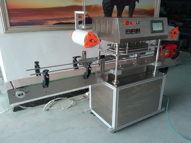 side pictures for automatic jars sealing machine செயல்படும் சீல் இயந்திரம்.jpg