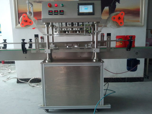 automatic three heads jars sealing equipment ஜாடிகளை சீல் செய்யும் இயந்திரம்.jpg