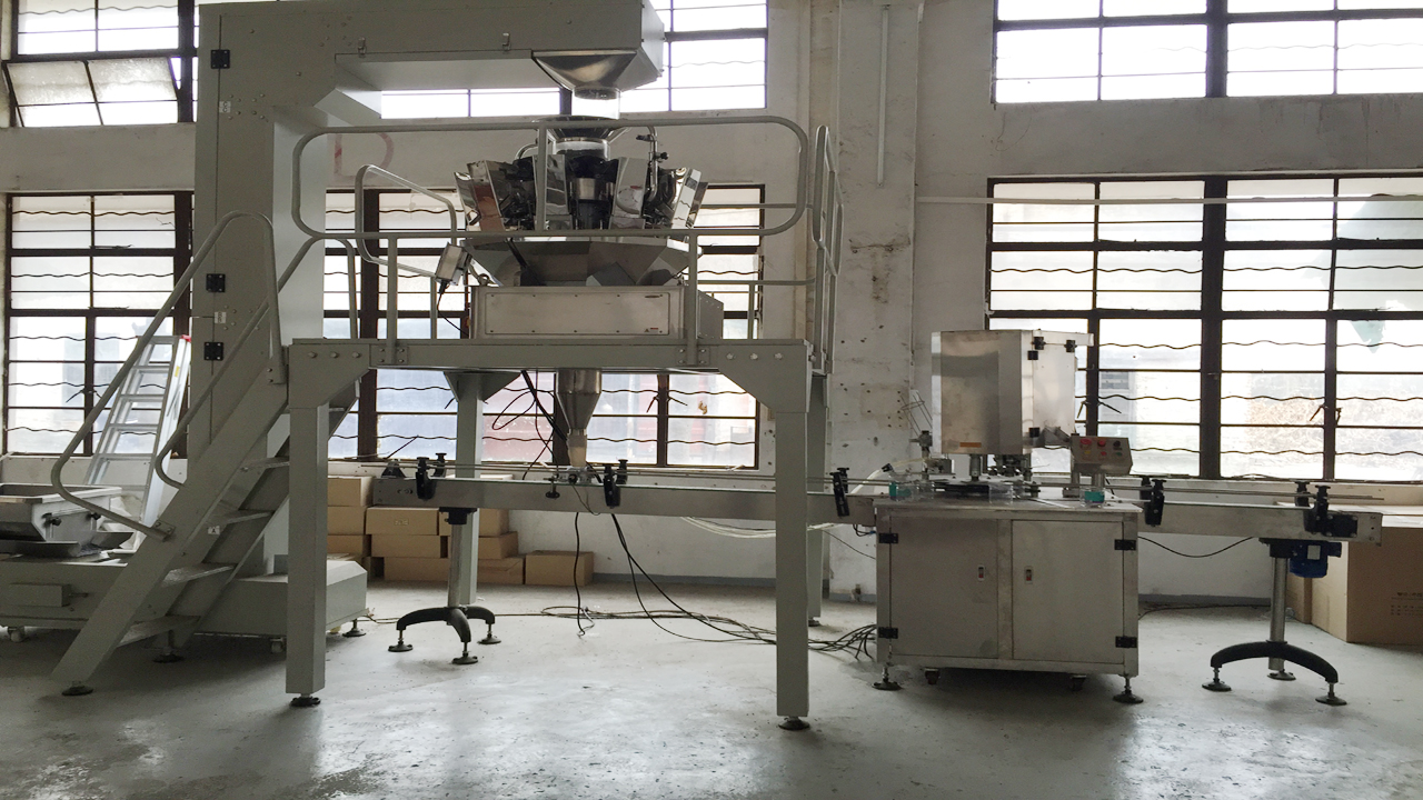 சீல் இயந்திரங்களை நிரப்பும் கேன்கள்.jpg