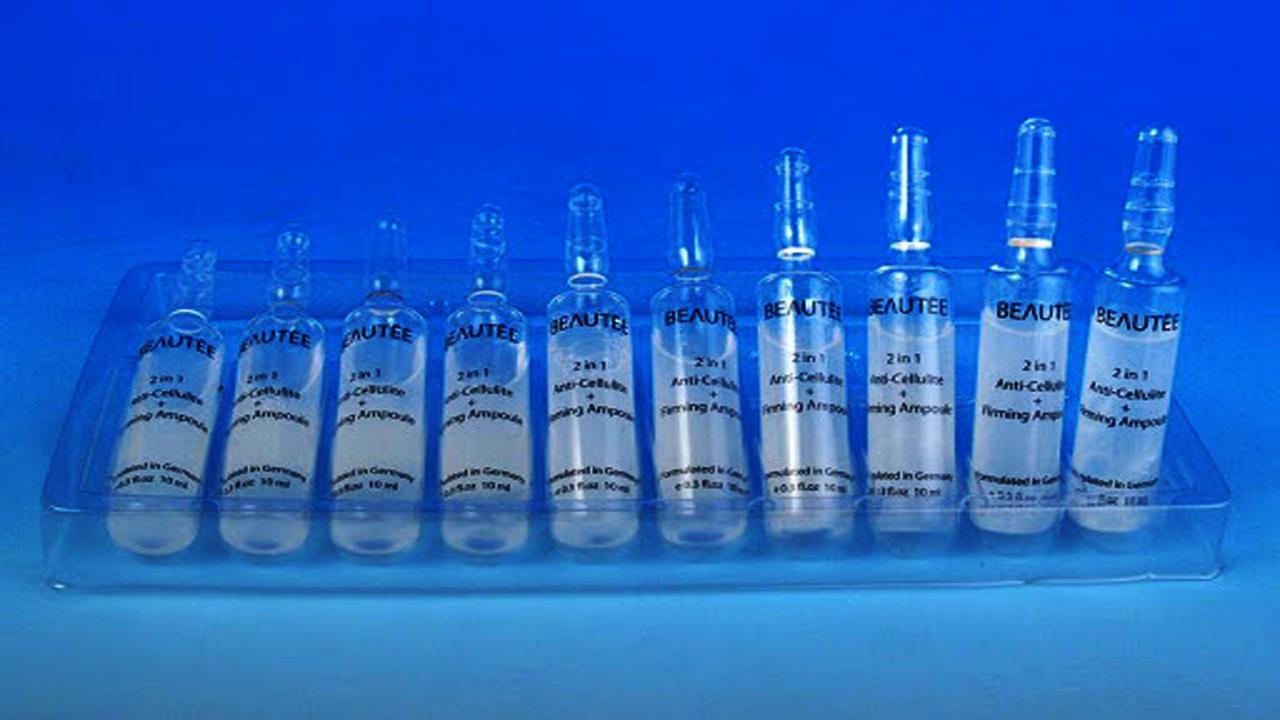 liquid solution bottles labeling machine samples final products ஆம்பூல் பாட்டில்கள்.jpg