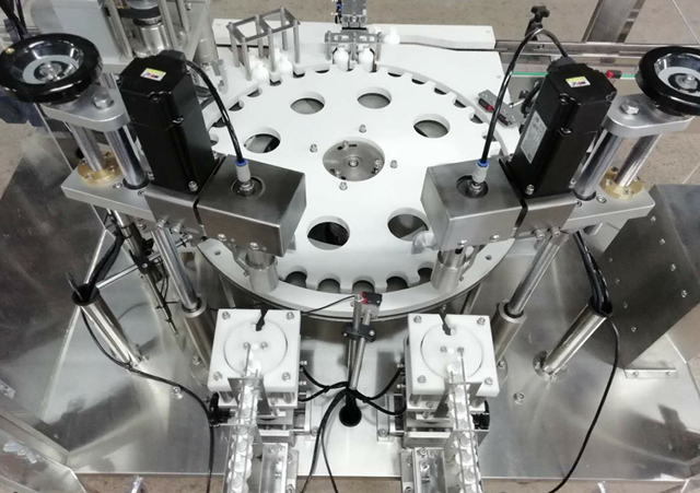 பாட்டில்கள் ரோபோ கை feeder.jpg