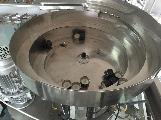 caps vibrator feeding system.jpg