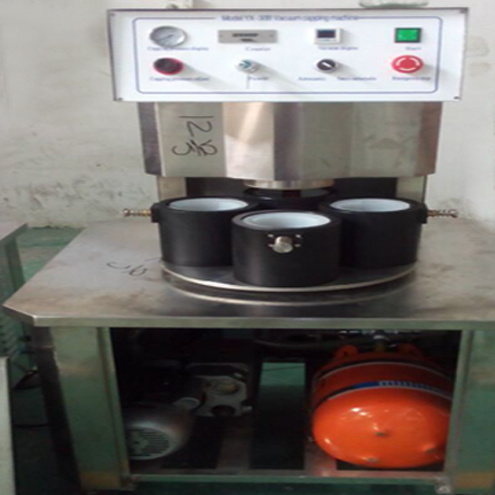 illustration of vacuum capping machine semi automatic வெற்றிட கேப்பிங்கிற்கான விளக்கப்படம்.jpg