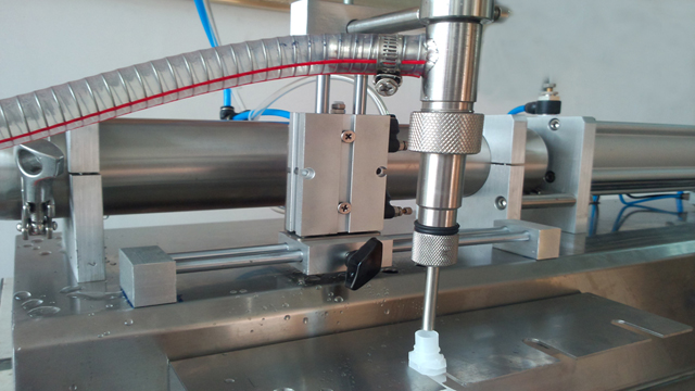 single head filling machine for spout bags with hopper spout filler.jpg