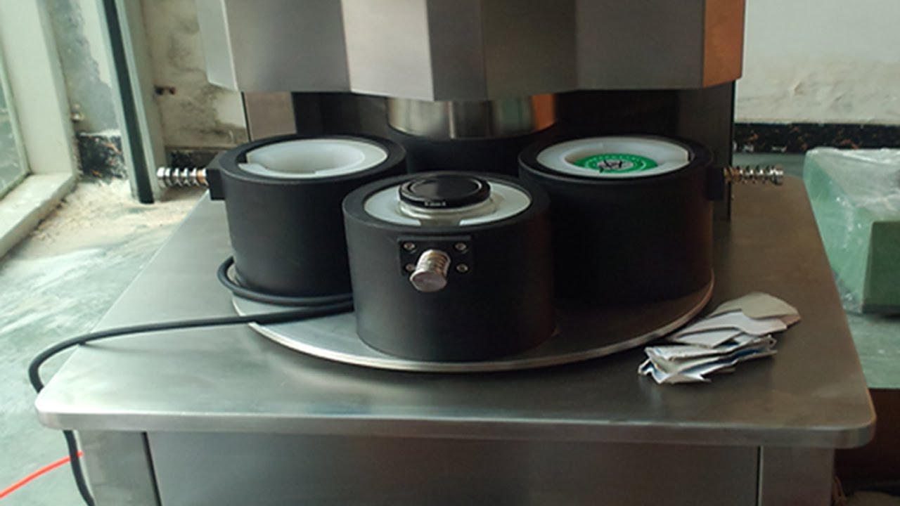 four heads vacuum capping machine semi automatic வெற்றிட கேப்பர் கையேடு.jpg