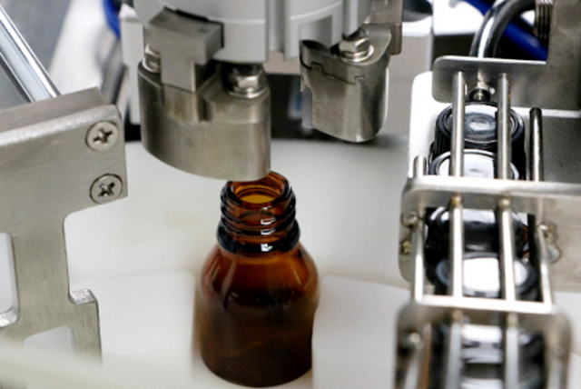 எண்ணெய் பாட்டில்கள் நிரப்பும் இயந்திரம் tabletop.jpg